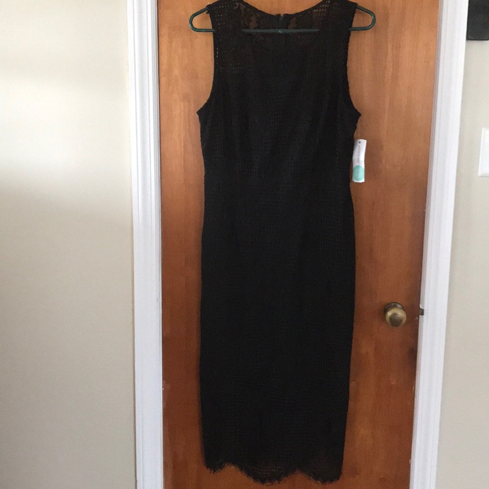 Truly poppy. Black spring dress.